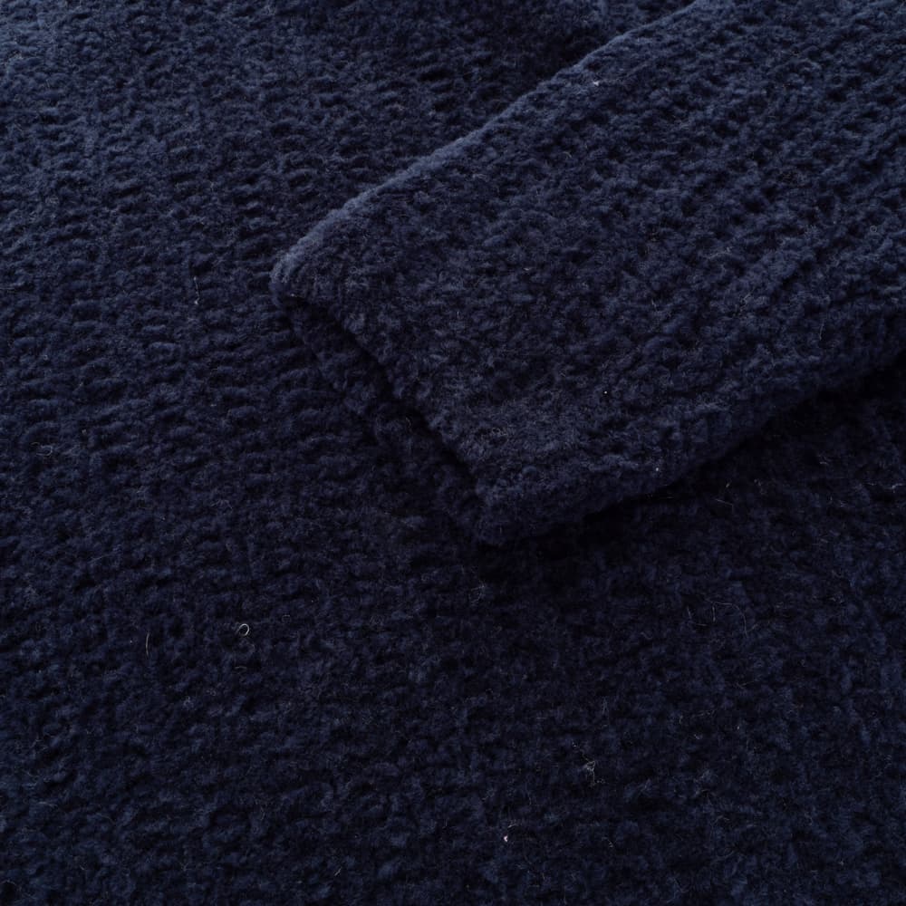 Bouclé-Strickpullover mit Rollkragen