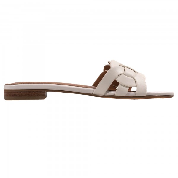 Bibi Lou slip-on in white with criss-cross strap, made of leather.